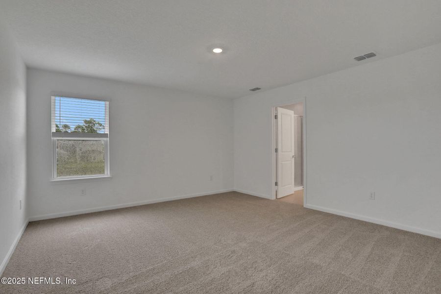 Spacious, unfurnished interior of a new home in TrailMark, St. Augustine (Image 34).