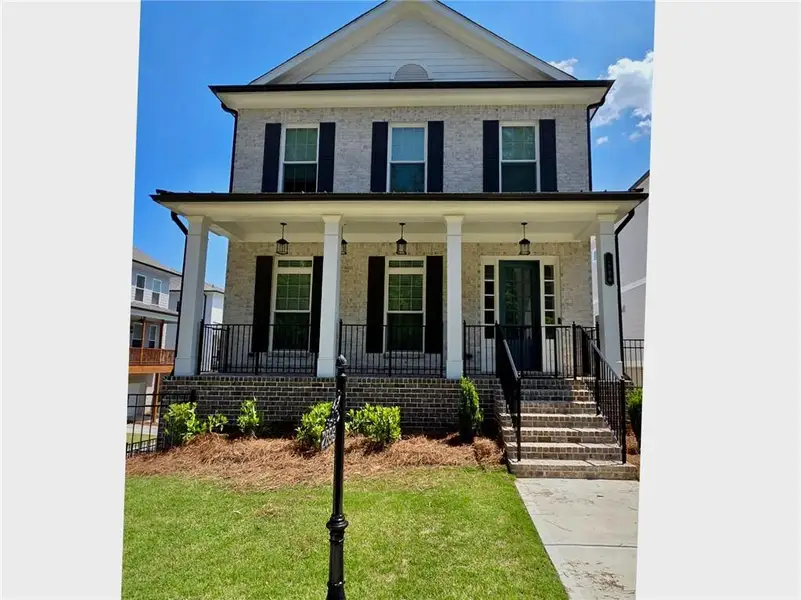 Front exterior of a new home in , Duluth, GA, highlighting curb appeal (Image 1). Front exterior of a new home in , Duluth, GA, highlighting curb appeal (Image 1).