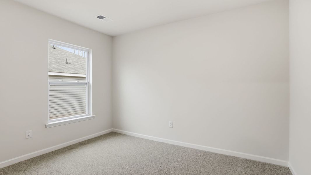Spacious, unfurnished interior of a new home in Bentley Park, Greenwood (Image 18).