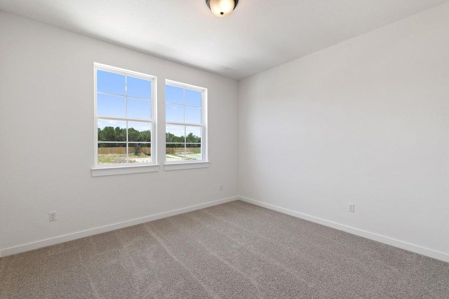 Spacious, unfurnished interior of a new home in Heritage, Dripping Springs (Image 29).