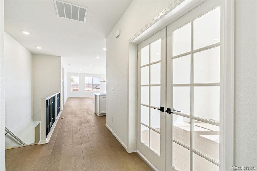 Spacious, unfurnished interior of a new home in Terrain Oak Valley, Castle Rock (Image 32).