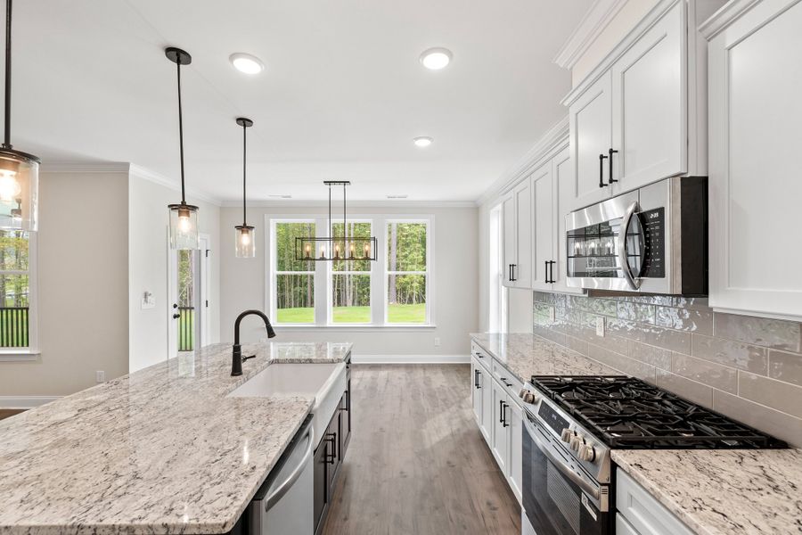 Representative furnished interior of a home built from the The Chandler by RobuckHomes in Baylee Ridge, Selma (Image 139).