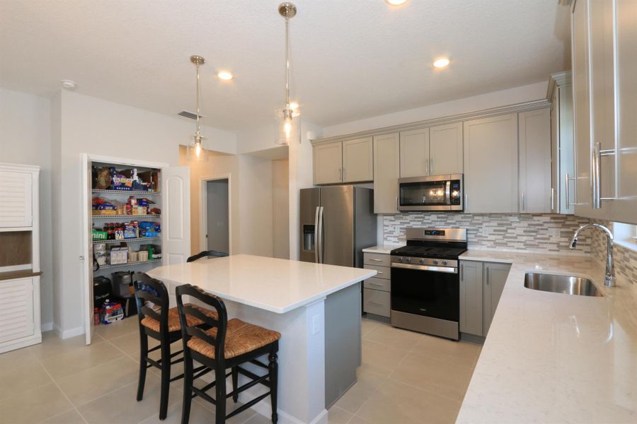 Furnished interior view inside a new home in Del Webb Tradition, Port St. Lucie (Image 10).