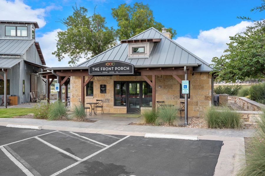 View of building exterior with uncovered parking View of building exterior with uncovered parking