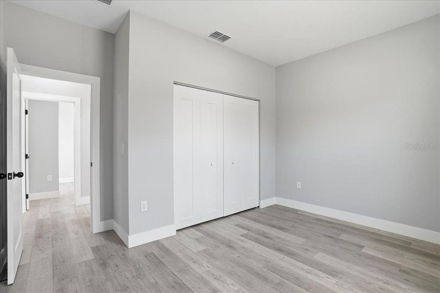 Spacious, unfurnished interior of a new home in , Port Charlotte (Image 36).