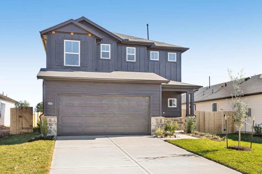 Front exterior of a new home in Montgomery Bend, Montgomery, TX, highlighting curb appeal (Image 1). Front exterior of a new home in Montgomery Bend, Montgomery, TX, highlighting curb appeal (Image 1).