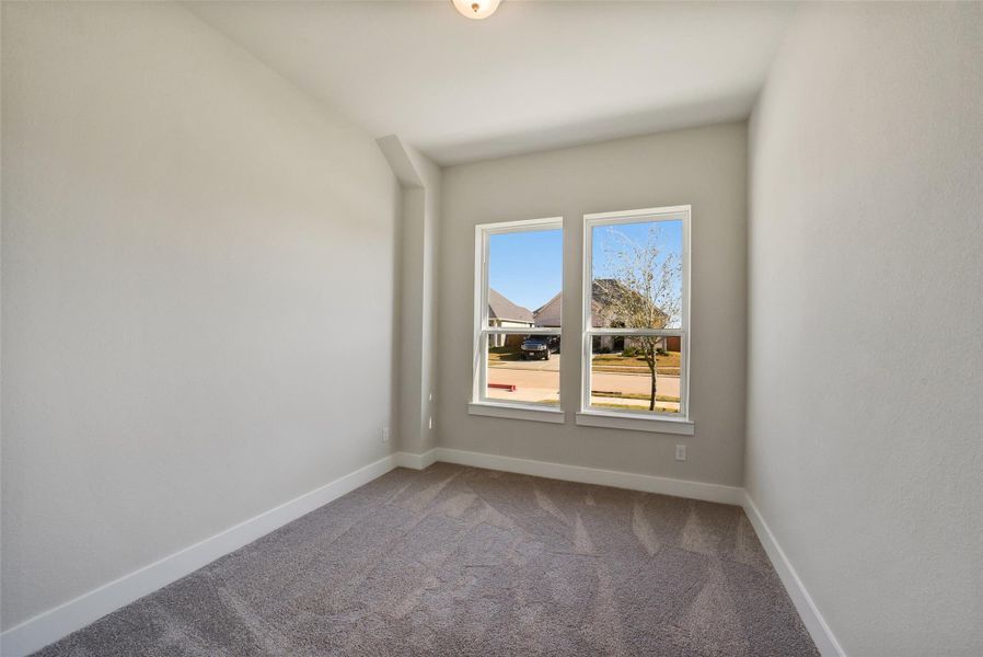 Spacious, unfurnished interior of a new home in Sunterra, Katy (Image 33).