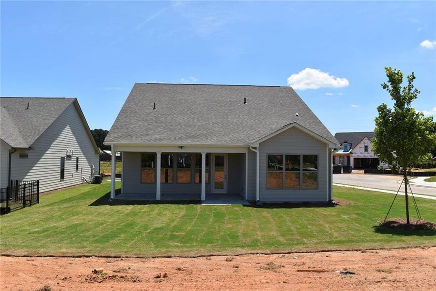 Exterior details and patio area of a home in Soleil Summit Chase, Snellville (Image 20).