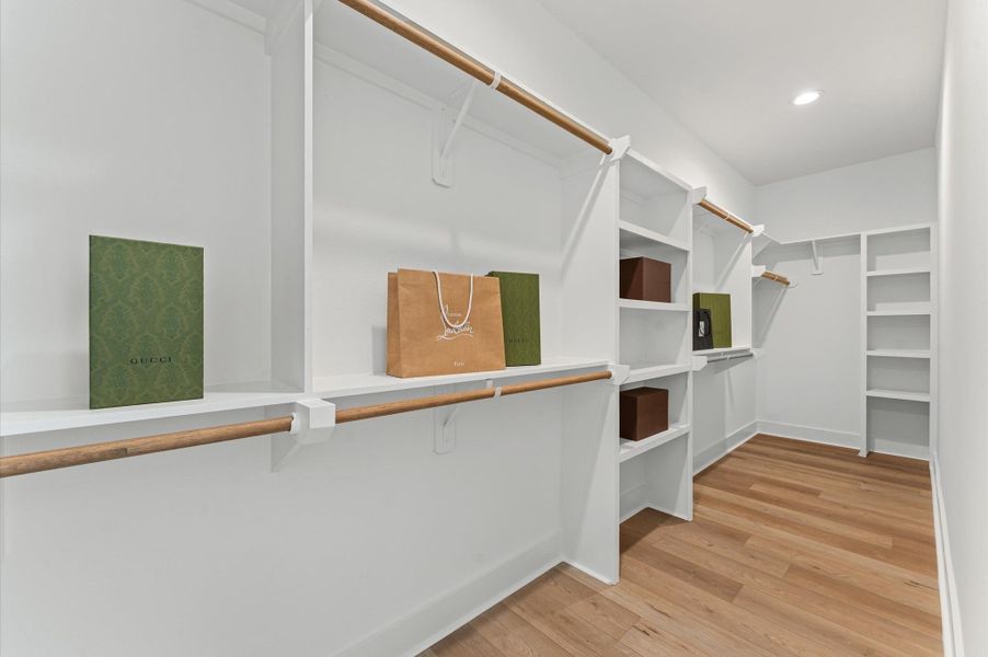 Huge primary bedroom closet.