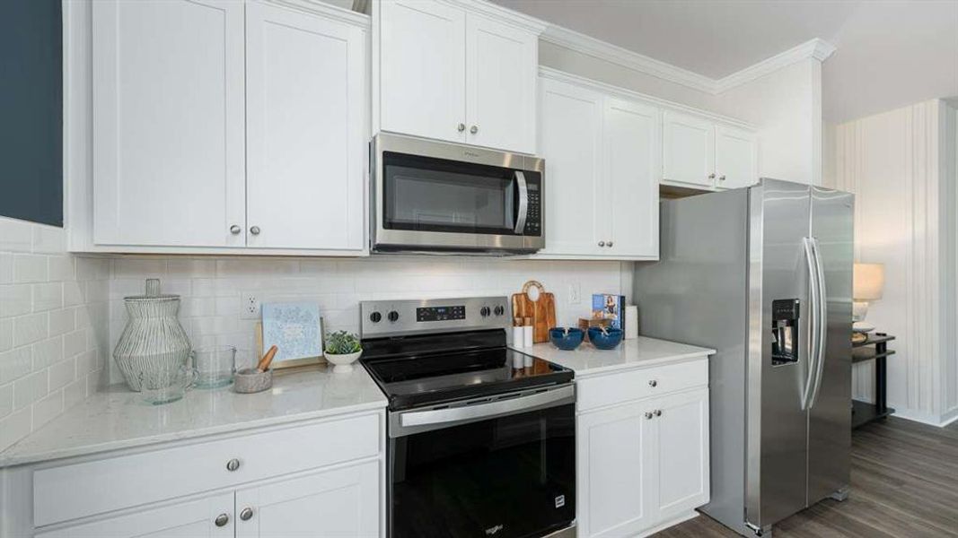 Furnished interior view inside a new home in Townes at Asbury, Hapeville (Image 27).