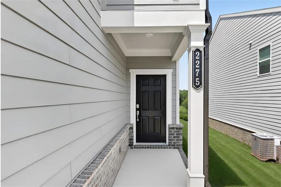 Exterior details and patio area of a home in Timber Ridge, Douglasville (Image 3).