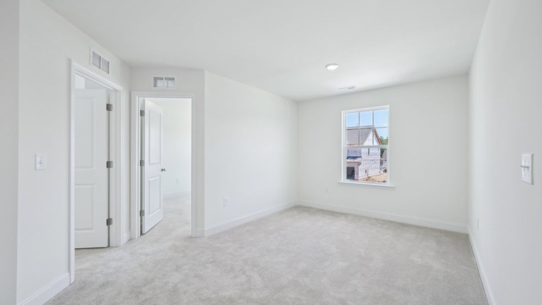 Representative furnished interior of a home built from the Bordeaux by DRB Homes in Sidney Creek Single Family, Zebulon (Image 24).