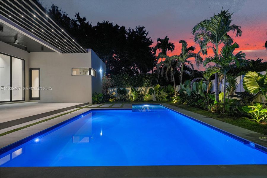 Exterior details and patio area of a home in , Miami Springs (Image 25).