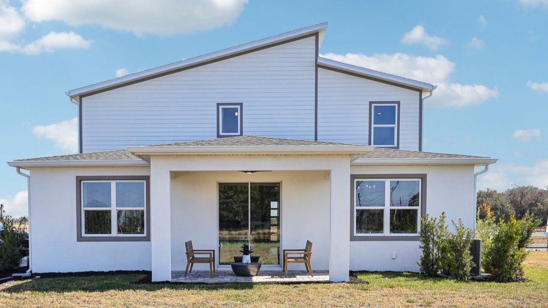 The Mangrove Model Rear Exterior in Modern Elevation at Lakeside at Satilla by DRB Homes in Saint Cloud, FL