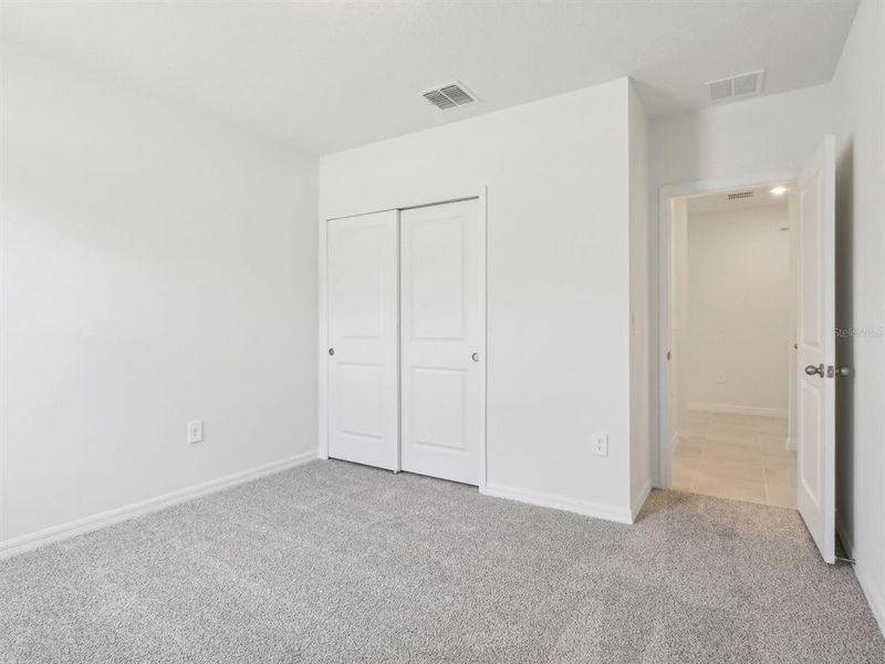 Spacious, unfurnished interior of a new home in The Reserve at Van Oaks, Auburndale (Image 30).