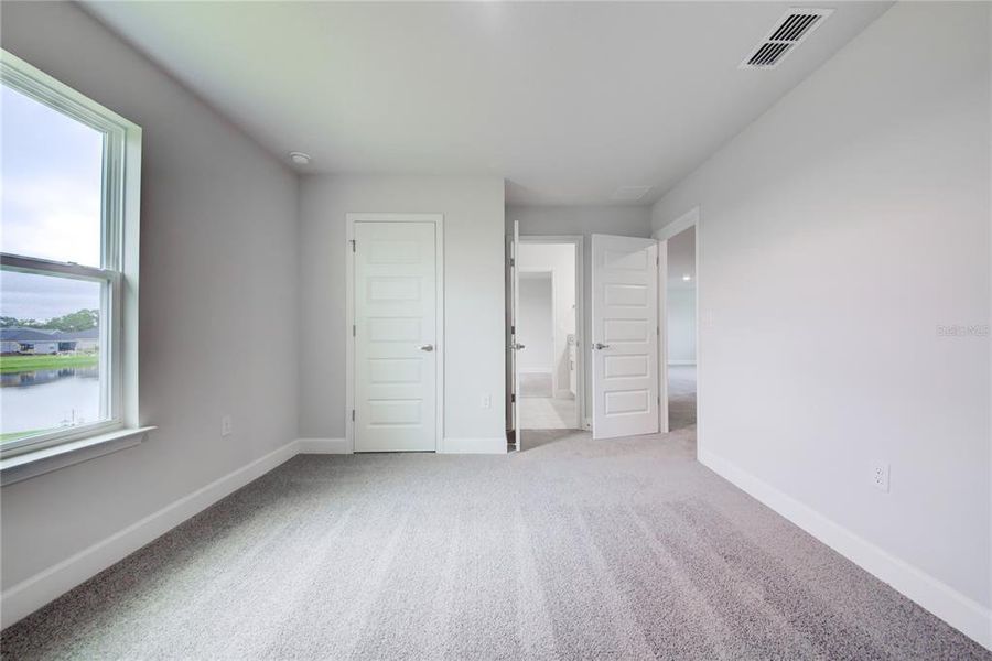 Spacious, unfurnished interior of a new home in Aviary at Rutland Ranch, Parrish (Image 14).