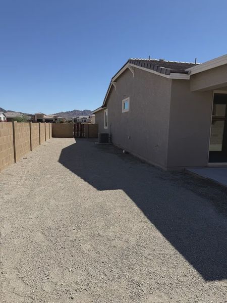 Exterior details and patio area of a home in Las Barrancas, Yuma (Image 4). Exterior details and patio area of a home in Las Barrancas, Yuma (Image 4).