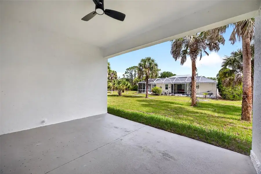 Exterior details and patio area of a home in , North Port (Image 23).
