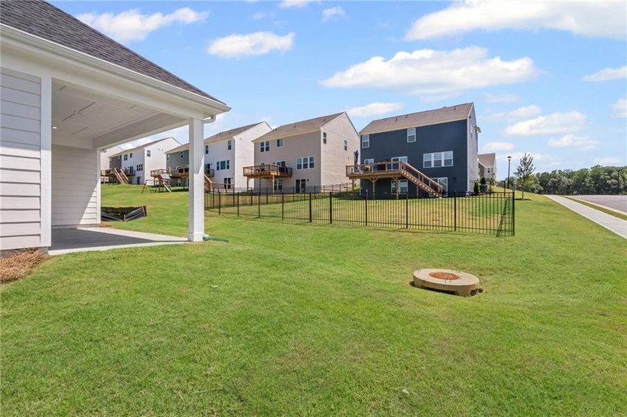 Front exterior of a new home in Twin Lakes, Hoschton, GA, highlighting curb appeal (Image 24). Front exterior of a new home in Twin Lakes, Hoschton, GA, highlighting curb appeal (Image 24).