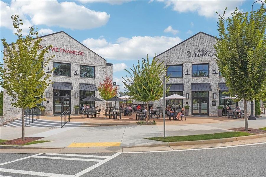 Front exterior of a new home in , Alpharetta, GA, highlighting curb appeal (Image 10).
