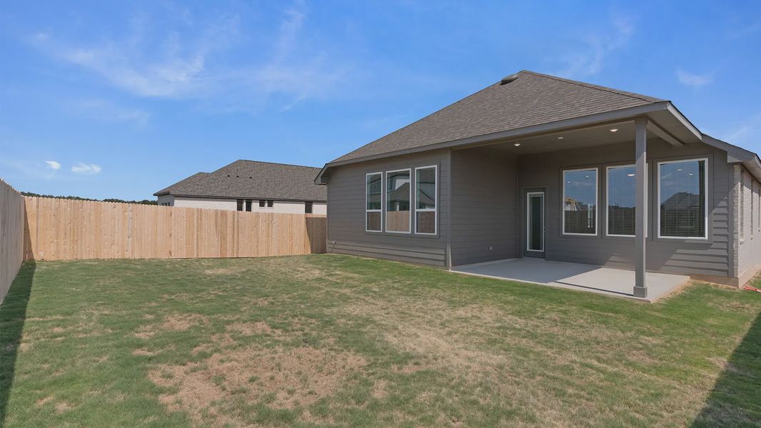Exterior details and patio area of a home in Santa Rita Ranch, Liberty Hill (Image 15).