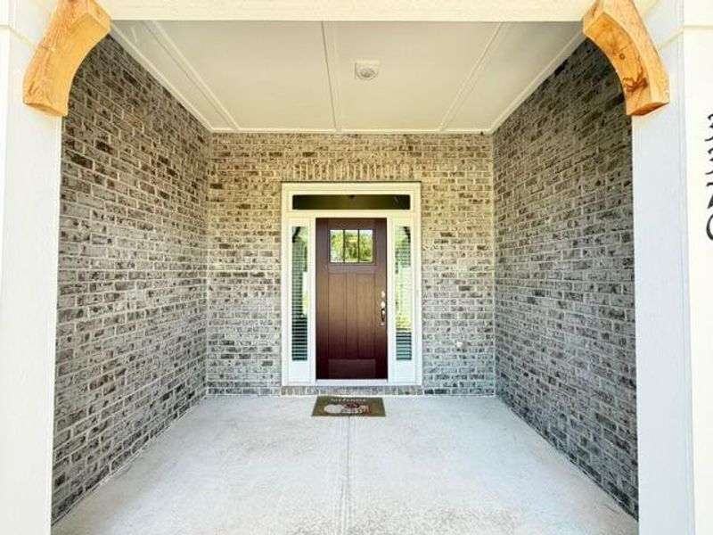 Exterior details and patio area of a home in Tuscany Hills, Douglasville (Image 18).