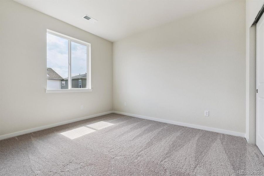 Spacious, unfurnished interior of a new home in Floret Collection at Parkdale Commons, Lafayette (Image 16).
