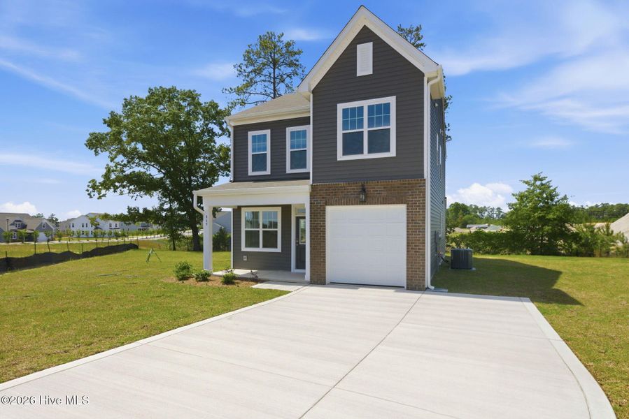 Front exterior of a new home in Sandy Springs, Aberdeen, NC, highlighting curb appeal (Image 17).