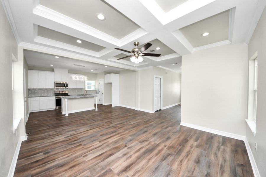 A final look at this stunning open-concept living space, designed for effortless gatherings. The spacious family room keeps everyone connected while maintaining easy access to the kitchen—perfect for entertaining and everyday living - (representation photo).