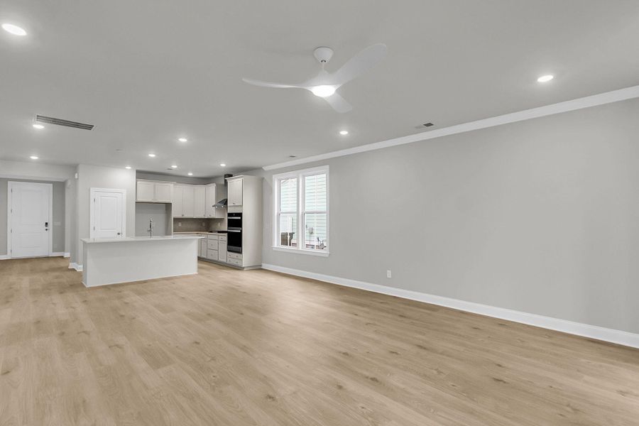 Spacious, unfurnished interior of a new home in Tidewater at Lakes of Cane Bay, Summerville (Image 29).