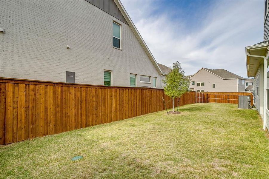 Exterior details and patio area of a home in Walsh, Fort Worth (Image 3). Exterior details and patio area of a home in Walsh, Fort Worth (Image 3).
