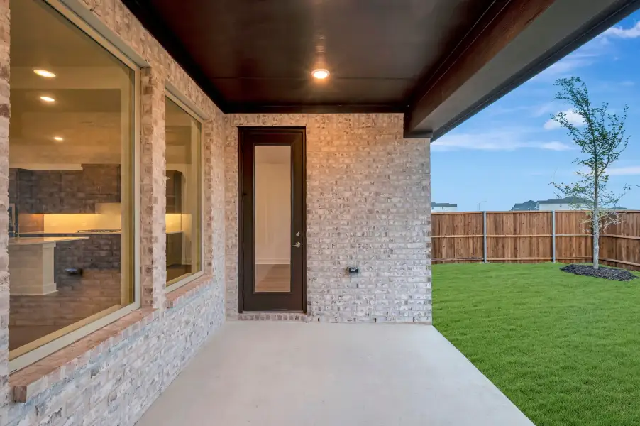 Exterior details and patio area of a home in LaPrelle, Fort Worth (Image 21).
