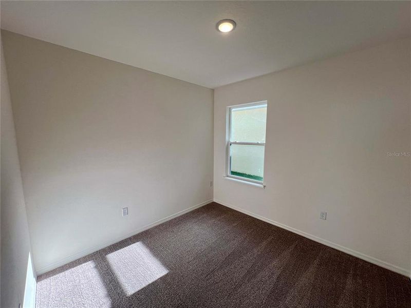 Spacious, unfurnished interior of a new home in Hammock Reserve, Haines City (Image 5).