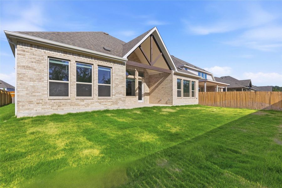 Exterior details and patio area of a home in Retreat at San Gabriel, Georgetown (Image 4).