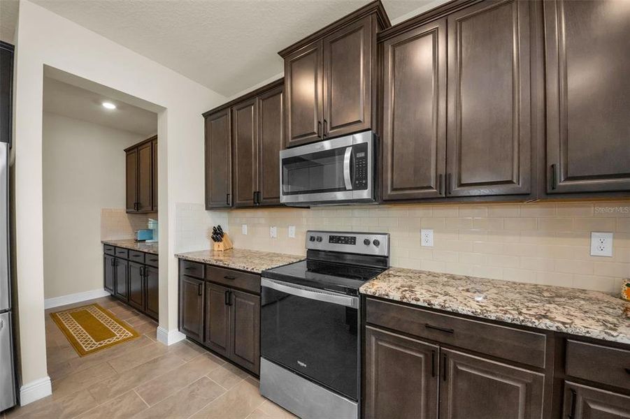 Furnished interior view inside a new home in Mangrove Manor, Apollo Beach (Image 48). Furnished interior view inside a new home in Mangrove Manor, Apollo Beach (Image 48).