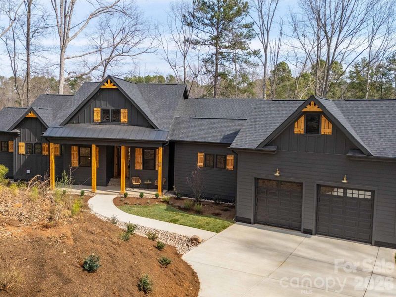 Front exterior of a new home in , Mooresville, NC, highlighting curb appeal (Image 26).