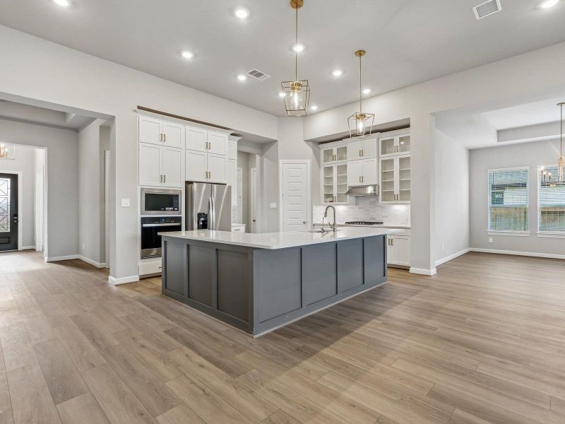 Furnished interior view inside a new home in Massey Oaks - Estate Series, Pearland (Image 7).