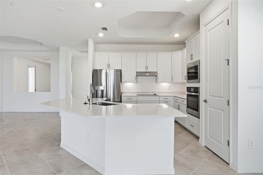 Furnished interior view inside a new home in Wellen Park Golf & Country Club, Venice (Image 5).