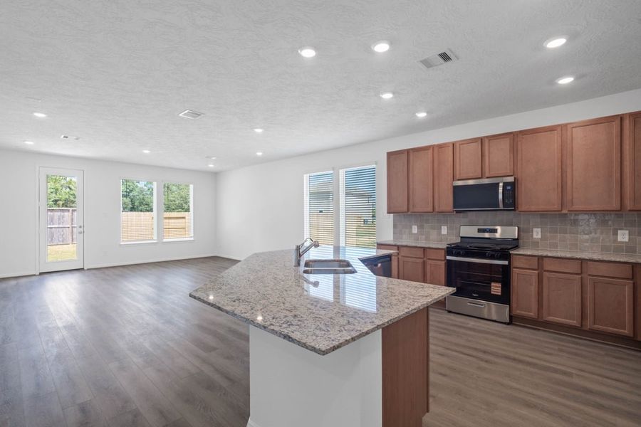 Furnished interior view inside a new home in Sagecrest Preserve, Conroe (Image 7).