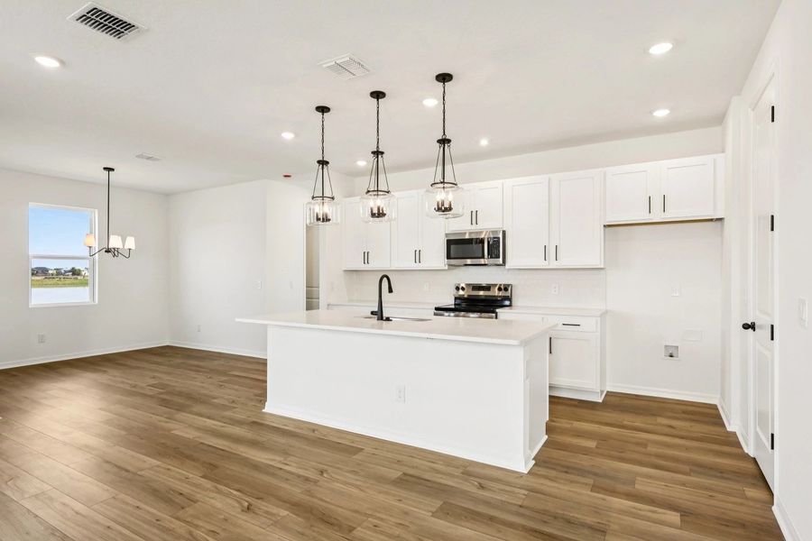 Furnished interior view inside a new home in Catamaran Cove, Rockledge (Image 3).