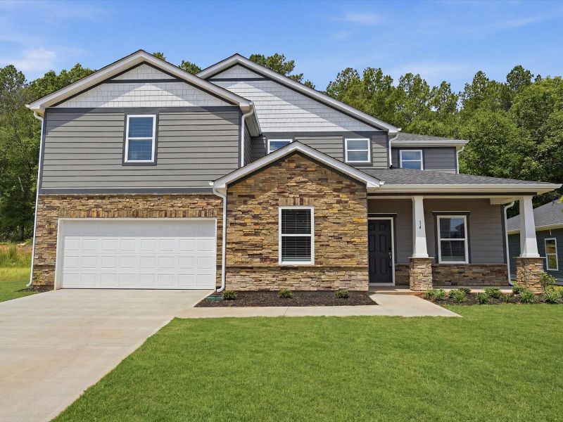 Front exterior of a new home in Wexford Park, Fountain Inn, SC, highlighting curb appeal (Image 1). Front exterior of a new home in Wexford Park, Fountain Inn, SC, highlighting curb appeal (Image 1).