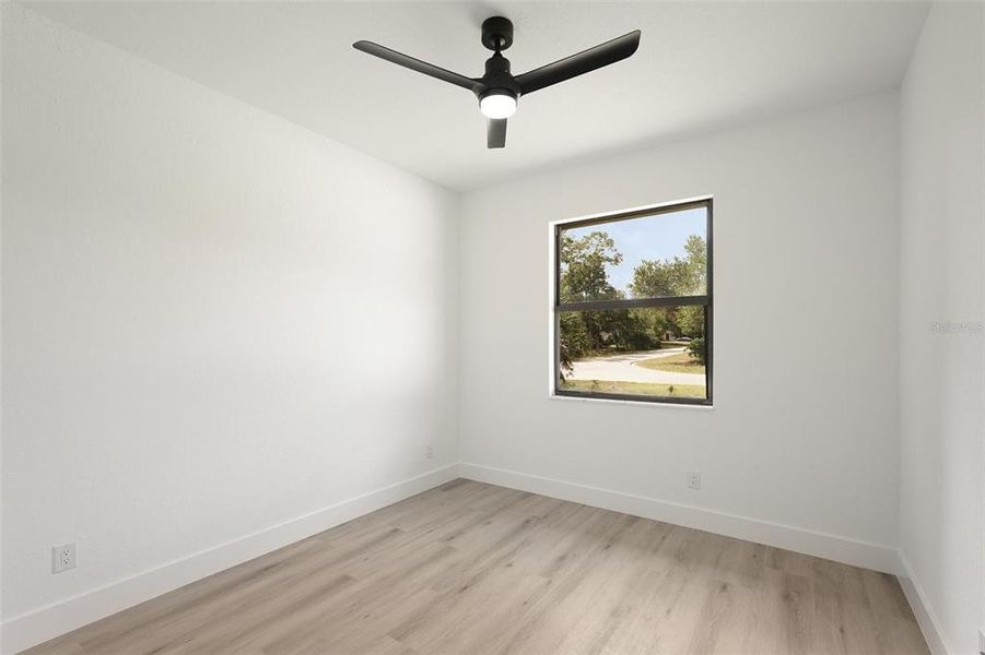 Spacious, unfurnished interior of a new home in , Port Charlotte (Image 32).