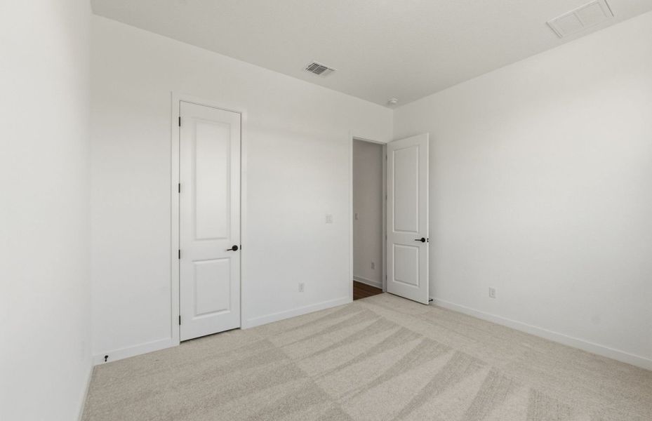 Spacious, unfurnished interior of a new home in 6 Creeks, Kyle (Image 17).