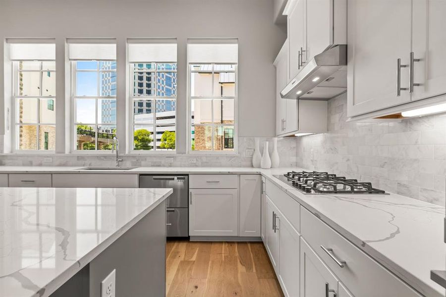 Image of model home with similar floorplan.