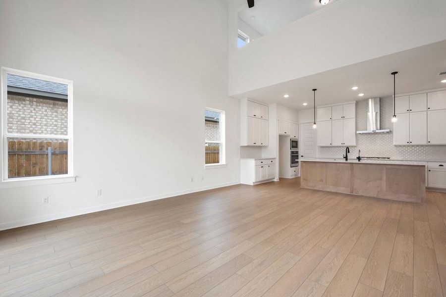 Spacious, unfurnished interior of a new home in Heritage, Dripping Springs (Image 28).