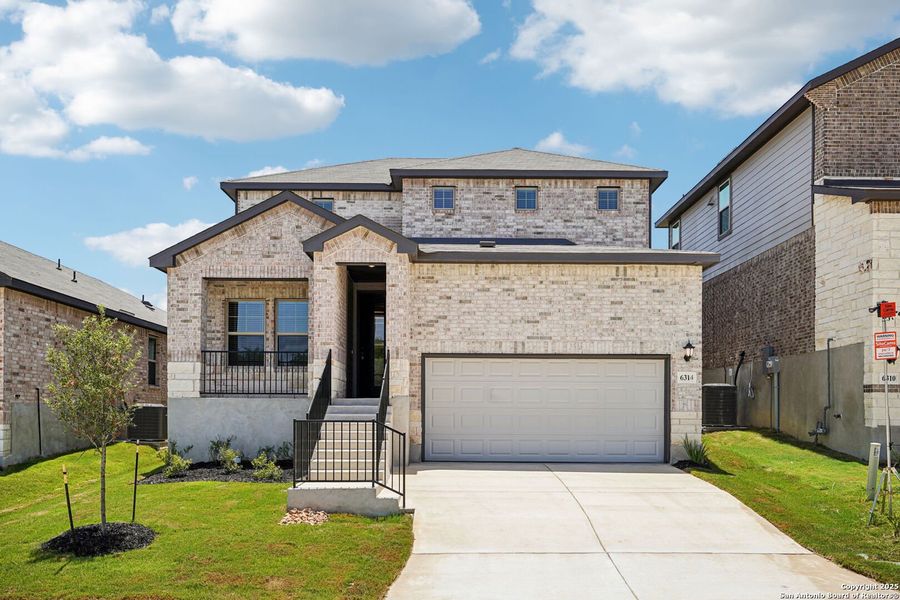 Front exterior of a new home in Comanche Ridge, San Antonio, TX, highlighting curb appeal (Image 23). Front exterior of a new home in Comanche Ridge, San Antonio, TX, highlighting curb appeal (Image 23).
