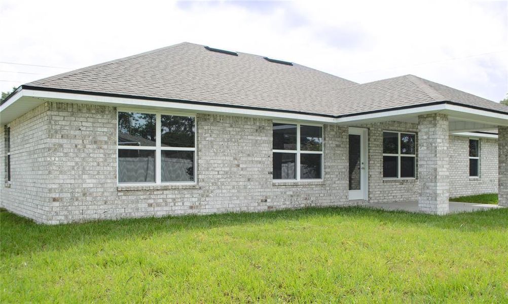 Exterior details and patio area of a home in Palm Coast, Palm Coast (Image 4). Exterior details and patio area of a home in Palm Coast, Palm Coast (Image 4).