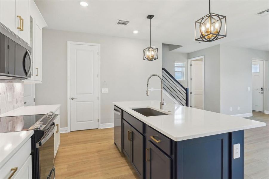 Furnished interior view inside a new home in Silverleaf Reserve Bungalows, Winter Garden (Image 4).