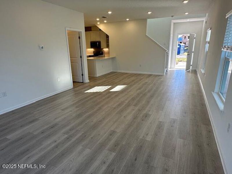 Spacious, unfurnished interior of a new home in Brook Forest - Villas, St. Augustine (Image 23).