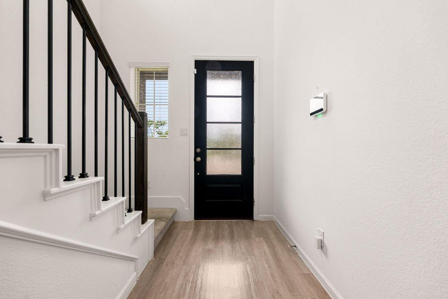 Spacious, unfurnished interior of a new home in Sunterra, Katy (Image 31).